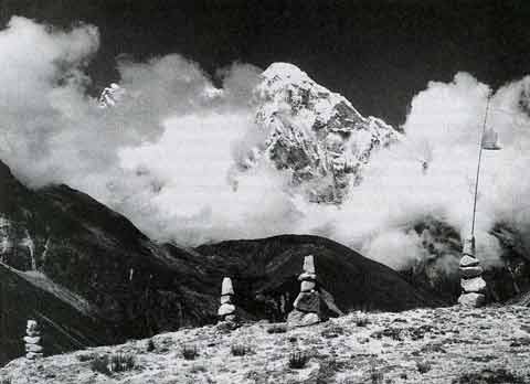 
Afternoon thermal clouds rise around Gauri Shankar, viewed from Menluntgse Base Camp in Tibet - Trekking in Tibet: A Traveler's Guide book
